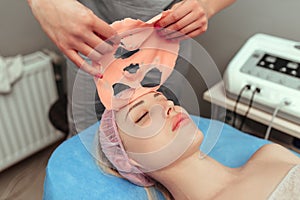 Beauty salon, applying of Alginate Peel-Off Powder facial Mask