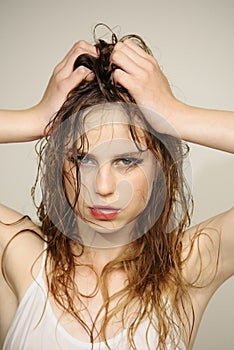 Beauty salon and hairdresser. Woman with brittle hair. Hair loss and care. Wet hair. Fashion portrait of woman. Girl