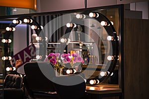 Beauty salon interior design space armchair and mirrors with inscription sale in reflection soft color illumination and no people