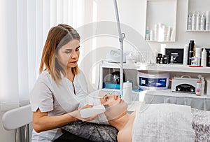 Beauty salon series, ultrasound skin cleaning. Ultrasound treatment.