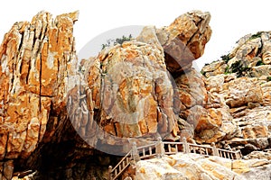 The beauty scenery of Rocky shore and mountains on Meizhou Island