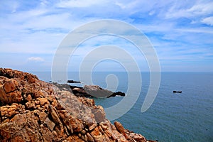 The beauty scenery of Rocky shore and mountains on Meizhou Island