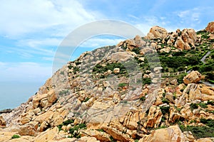 The beauty scenery of Rocky shore and mountains on Meizhou Island