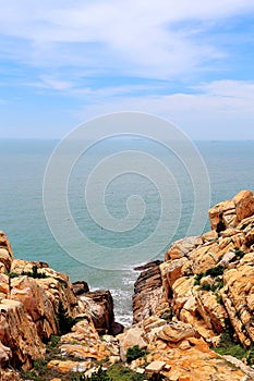 The beauty scenery of Rocky shore and mountains on Meizhou Island