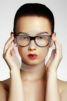 Beauty fashion model girl wearing glasses