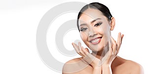 Beauty shot of young pretty asian woman with clear skin ongrey b