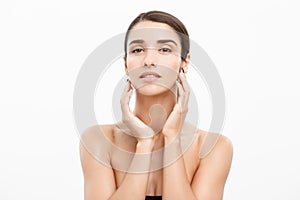 Beauty Skin Care Concept - Beautiful Caucasian Woman Face Portrait. Beautiful beauty young female model girl touching