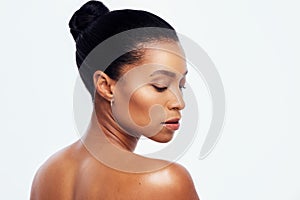 Beauty, skincare and back of black woman in studio for wellness, healthy body and dermatology. Self care, spa aesthetic