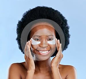 Beauty, skincare and eye mask with portrait of black woman in studio for facial, cosmetics or dermatology. Spa, wellness