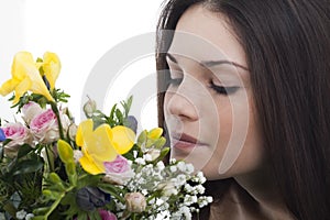 Beauty smelling flowers