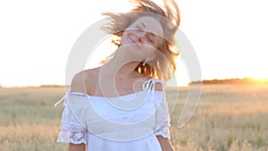 Beauty Smiling Girl on the Gold Field. Laughing And Happy young model woman