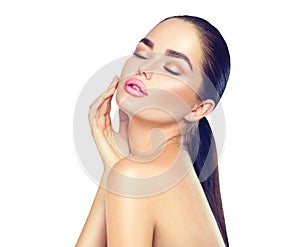 Beauty spa brunette woman touching her face. Skincare