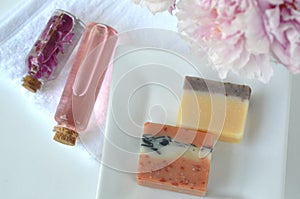 Beauty Spa cosmetics with pink peonies and luxury creams