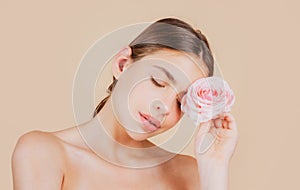 Beauty spa woman face with natural make up and rose flowers, fresh beauty model young spa. Beautiful female wellness