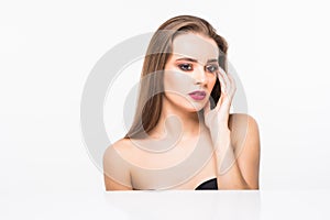 Beauty Spa Woman with perfect face skin Portrait. Proposing a product isolated on white.