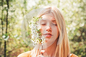 Beauty spring girl. Tenderness girll with Flovers. Springtime.