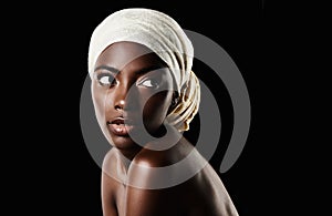 Beauty, studio and black woman with head scarf, natural makeup or creative aesthetic in mockup space. Art, skincare and