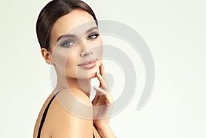 Beauty-style portrait of appealing, young woman. Makeup and beauty technologies.