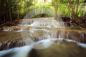 Beauty sun ray over waterfall in nature, huay mae khamin nationa photo