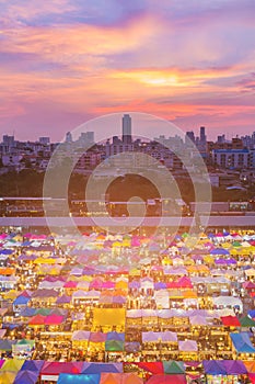 Beauty sunset sky over night flea market aerial view