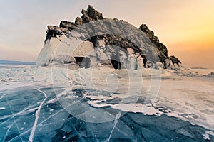 Beauty of sunset sky over rock mountain on Baikal Siberia water lake