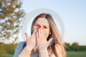 Beauty Sunshine Girl Portrait. Happy Woman Smiling. Sunny Summer Day under the Hot Sun.