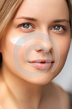 Beauty, suntan spf and skincare cosmetics model face portrait, woman with moisturising cream, sunscreen product or sun photo