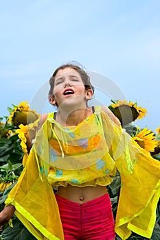 Beauty teen girl and sunflower