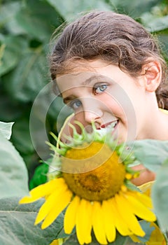 Beauty teen girl and sunflower