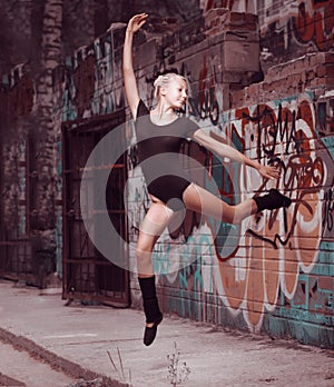 Beauty teenager girl dance on street