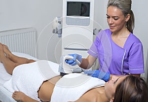 Beauty treatment of a young woman in specialized clinic