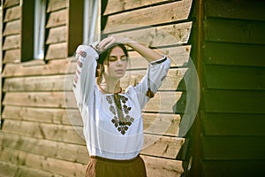 Beauty wearing Romanian blouse called ie