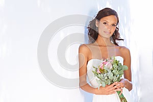 Beauty, wedding and bouquet with portrait of woman at venue for love, celebration and engagement. Ceremony, reception