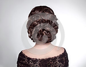 Beauty wedding hairstyle. Bride. Brunette girl with curly hair s