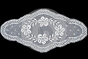 Beauty white oval lace tablecloth isolated on black background, floral pattern