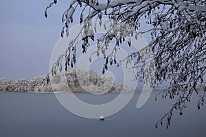 The beauty of a winter\'s day is on display in this image of Galve Lake in Trakai, Lithuania.