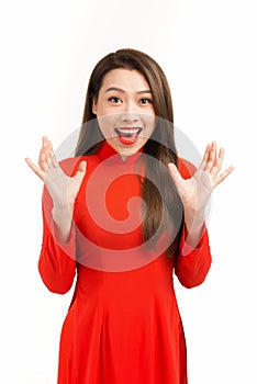 Beauty woman in ao dai and feel excited with lunar new year Tet holiday