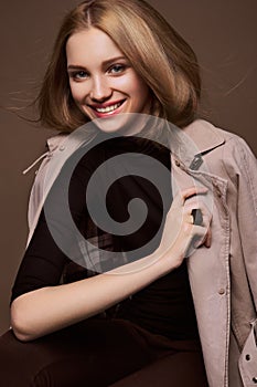 Beauty Woman. Beautiful Young Female. Portrait isolated on Brown Background. Healthcare. Perfect Skin.