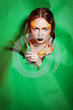 Beauty woman with bunch rose flowers