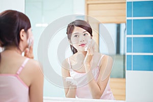 Beauty woman clean her face