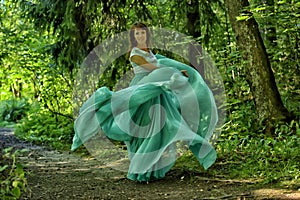 Beauty woman with dress flying