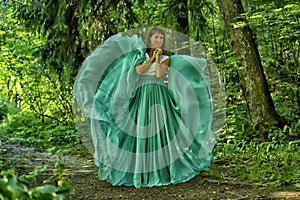 Beauty woman with dress flying