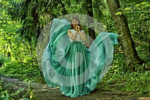 Beauty woman with dress flying