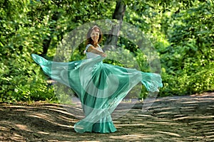 Beauty woman with dress flying