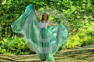 Beauty woman with dress flying
