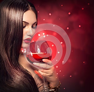 Beauty woman drinking red wine