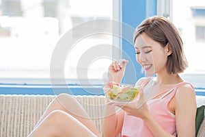 Beauty woman eat salad