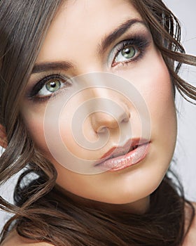 Beauty woman face close up portrait. Light make up