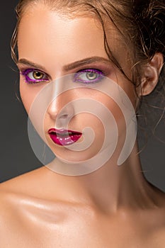 Beauty woman face closeup on black background. Beautiful