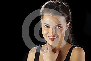 Beauty woman face closeup isolated on black background